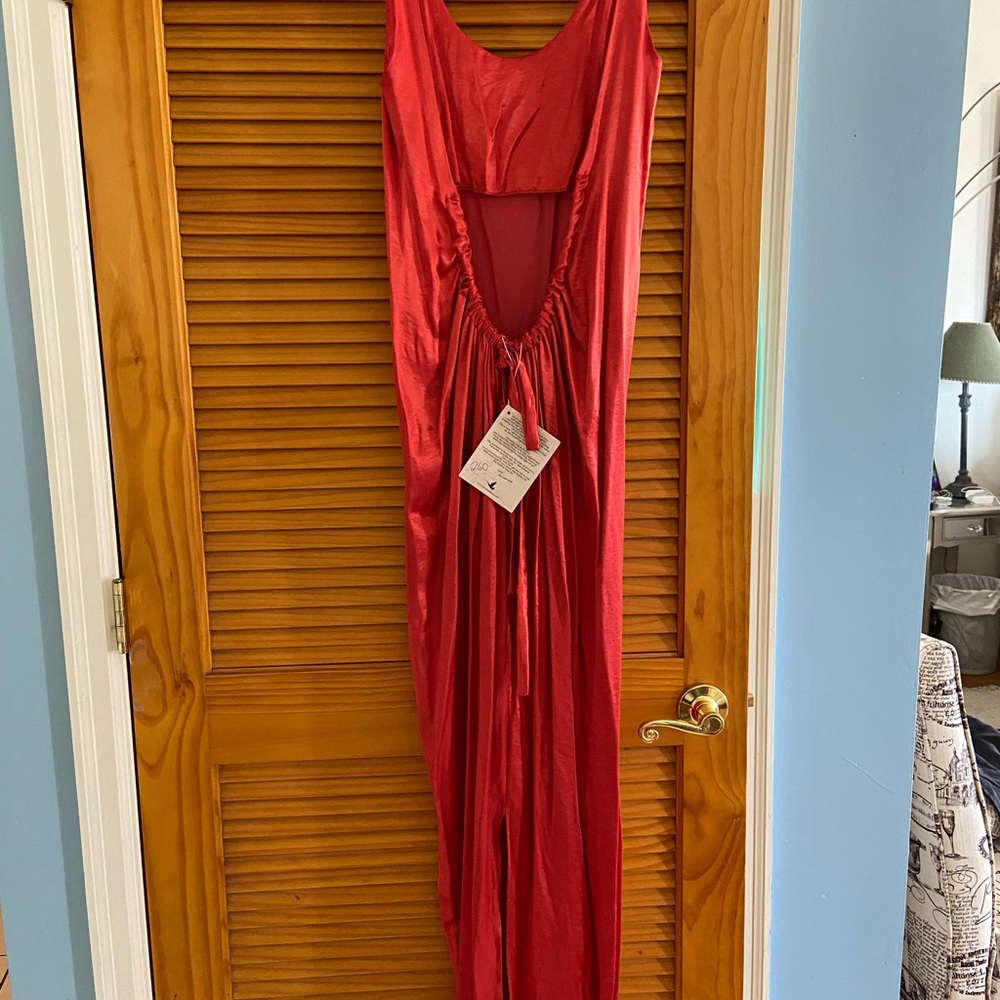 Reddish orange color maxi dress with open back